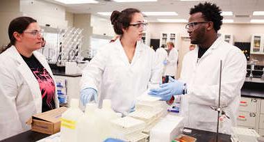 Students in a science lab doing an experiment